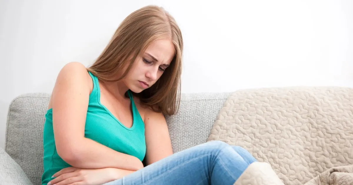 Woman with stomach ache